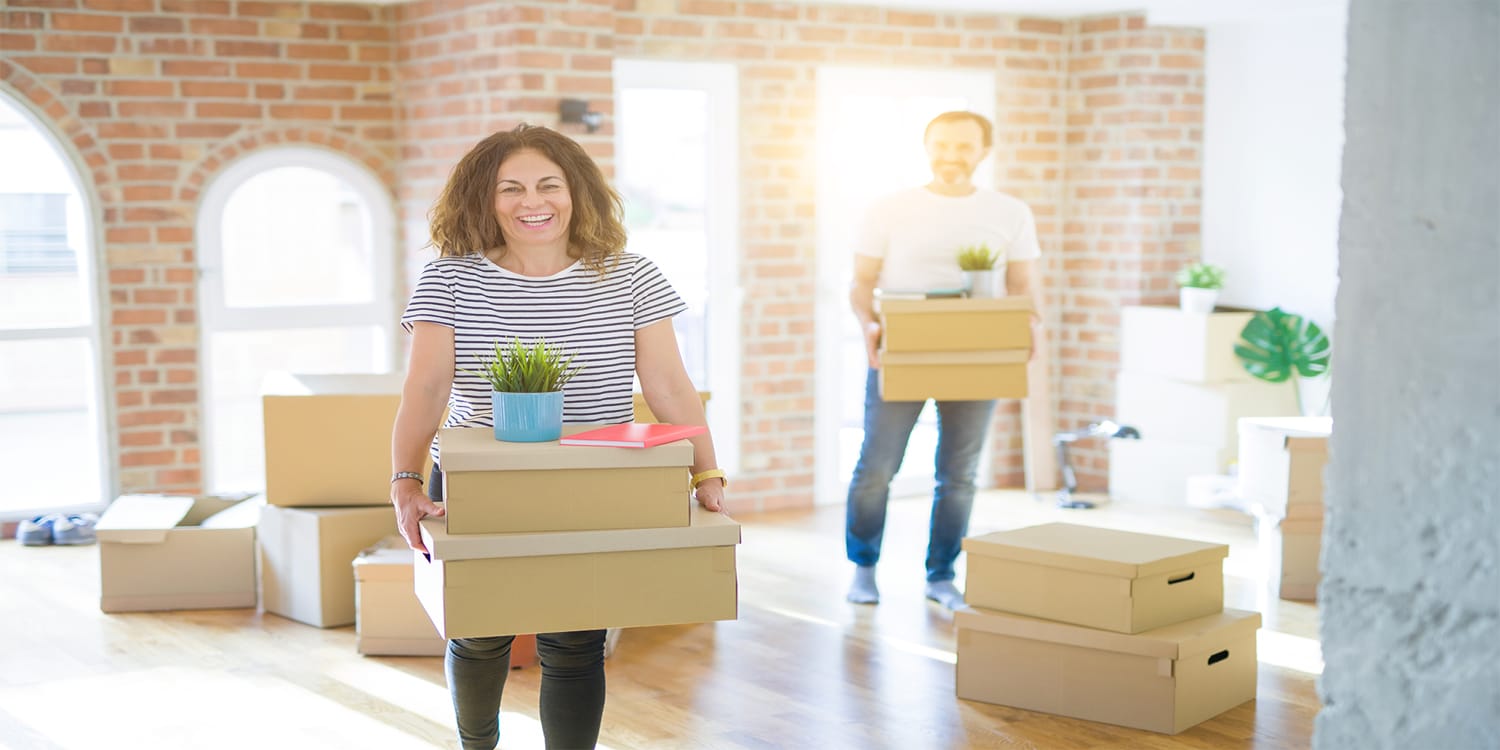 Happy couple moving for job relocation